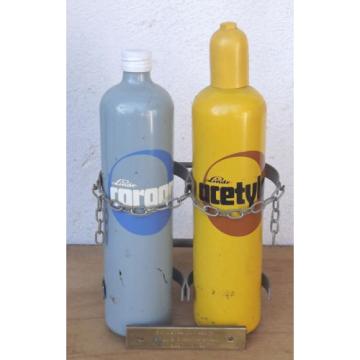 Linde Acetylene/Corgon Schnapps bottles on hand trucks - Decorational object